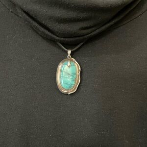 Elegant Silver and Turquoise Pendant